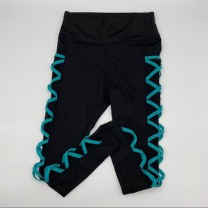 Women’s black leggings with teal blue size s/m